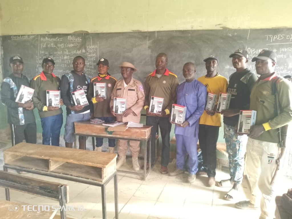 CoDRAF distributing communication equipment to community security volunteers