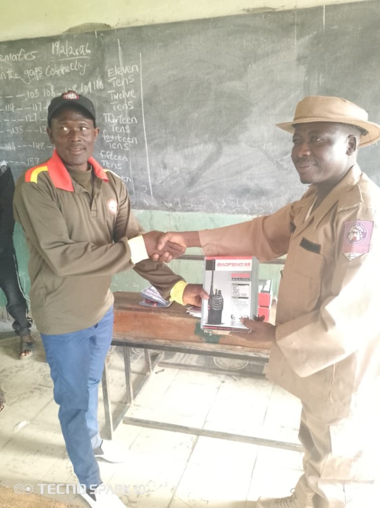 Security personnel receiving radio communication equipment